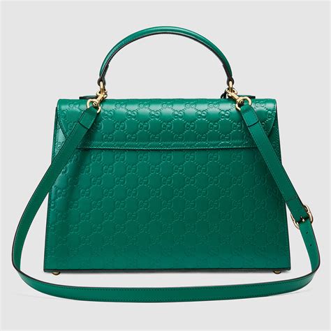 green gucci clutch